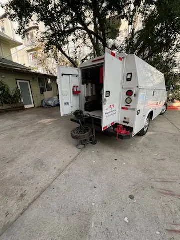 Magnet Plumbing service vehicle on-site for Water Heater Repair in Brush